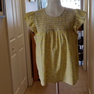 J Crew re imagined yellow floral  blouse size medium with cap frill short sleeve